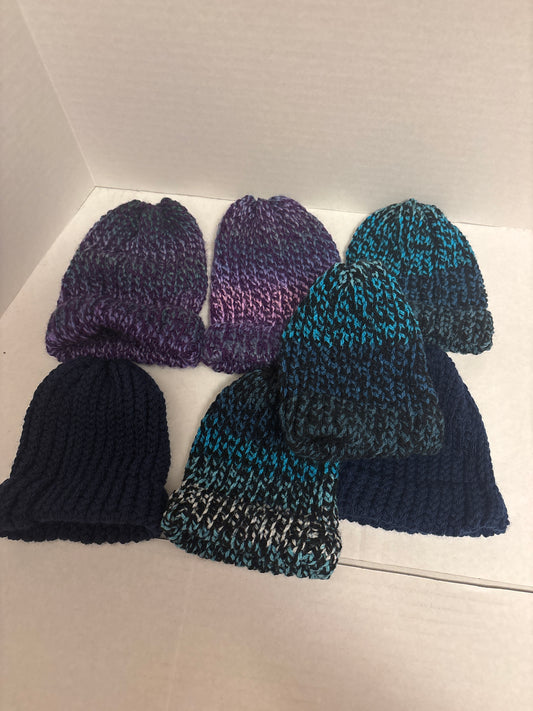 Purple baby hats and blue baby hats