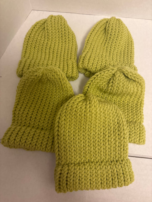 5 green baby hats